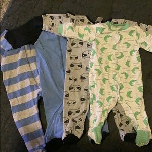 3x 6-9 month 1x 6 month footie pajamas